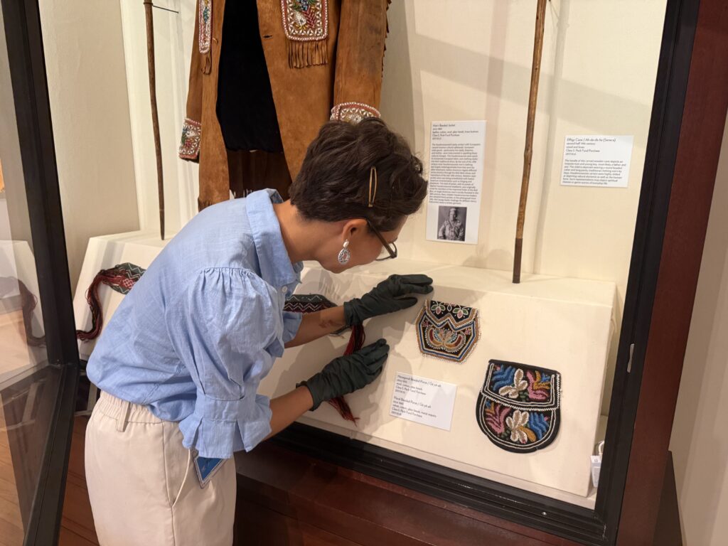 Woman looking closely at object